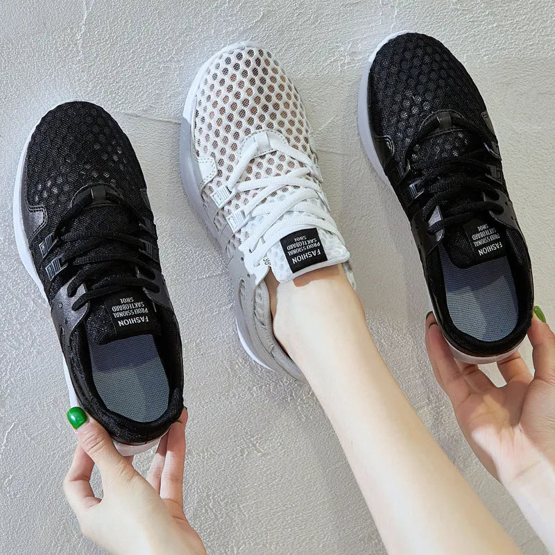 Casual mesh sneakers with hollow-out breathable design and round toe in black and white colour options