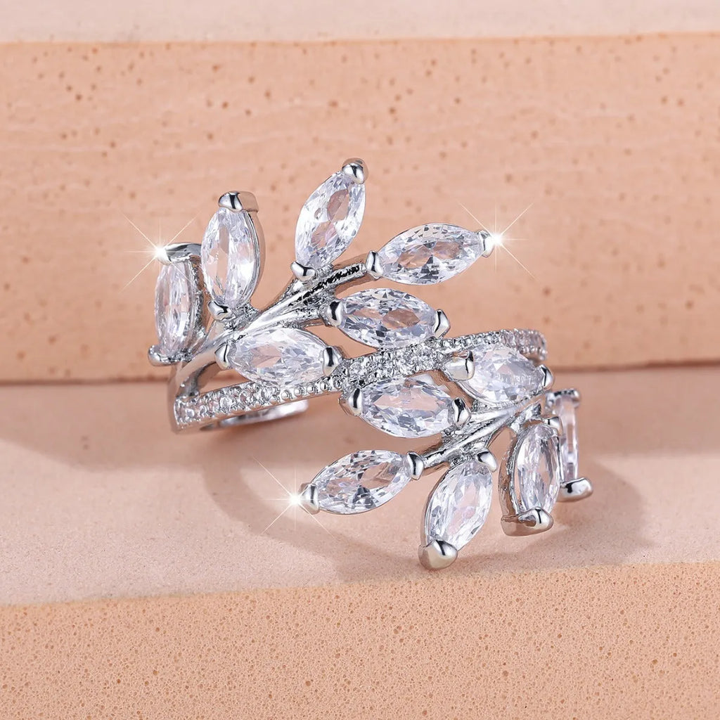 Adjustable leaf-shaped ring with horse eye cubic zirconia design in copper with rose gold plating