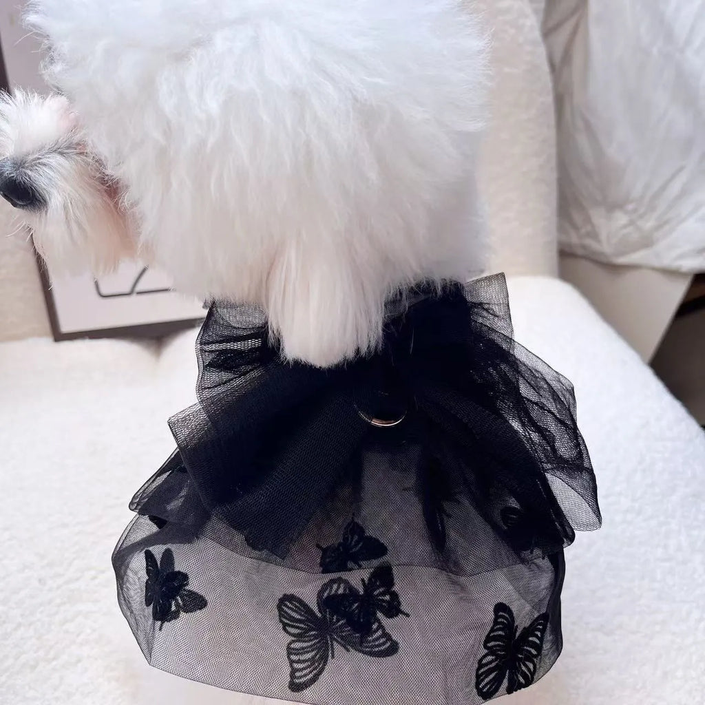 Black tulle princess skirt pet costume on small dog with size chart showing five available sizes