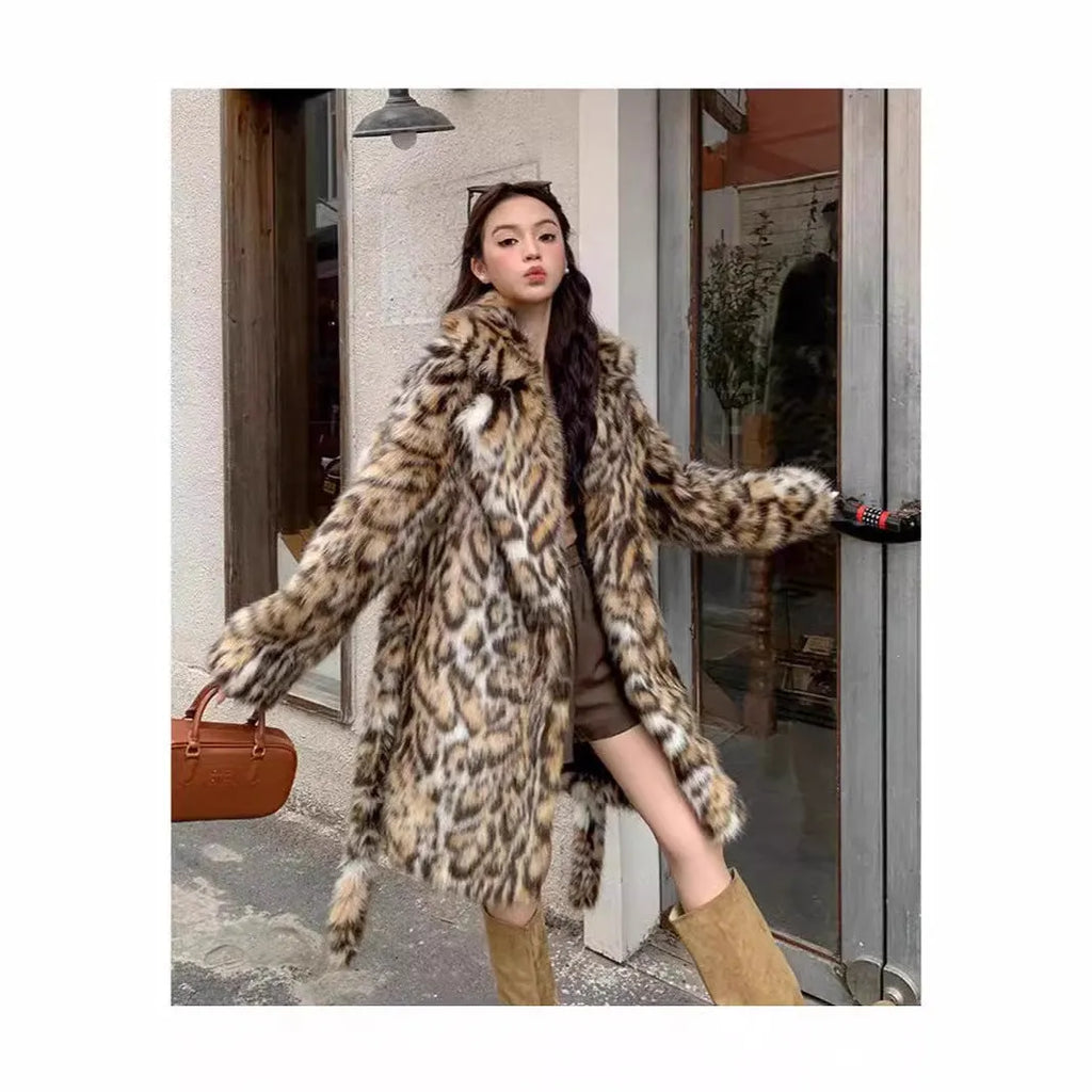 Women's artificial fur coat with collar in street fashion style showing pocket detailing