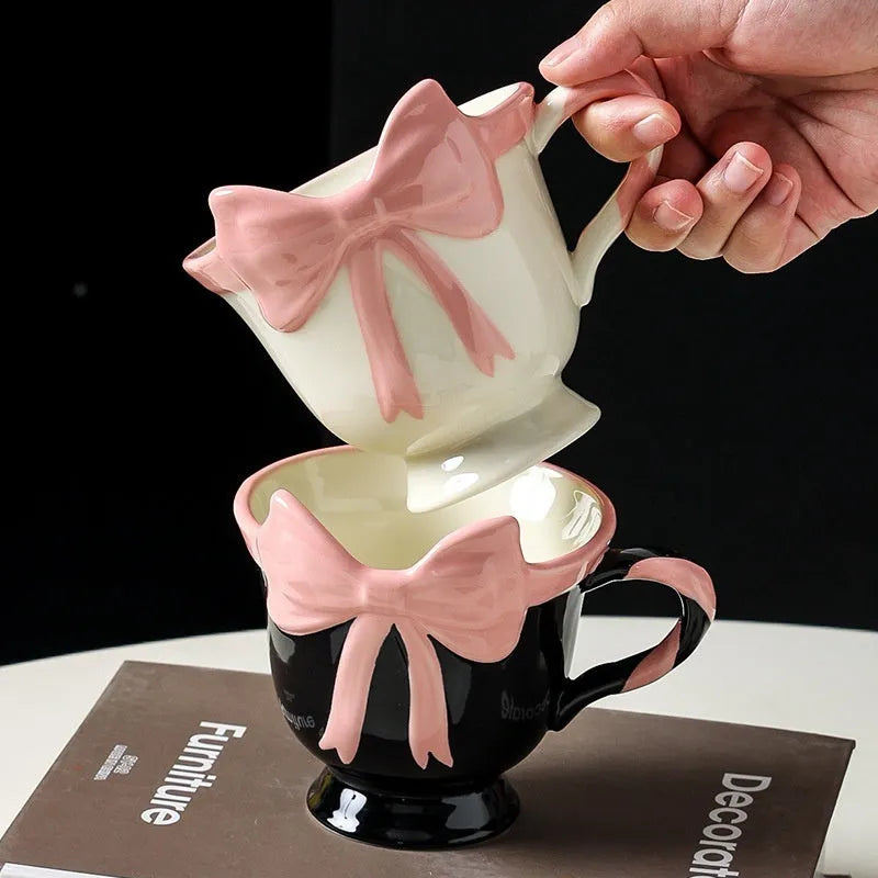 Ceramic mug with a girl heart bow design in white powder and black pink colour options