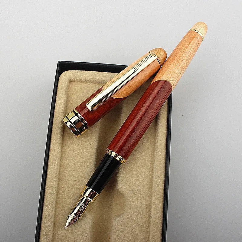 Metal ballpoint pen with wooden colour finish and black bag on white background