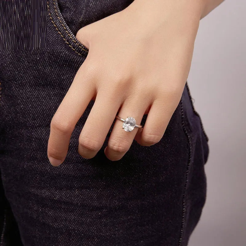 Oval cut 35 karat zircon engagement ring in silver with gold or silver electroplating, US sizes 6 to 8.