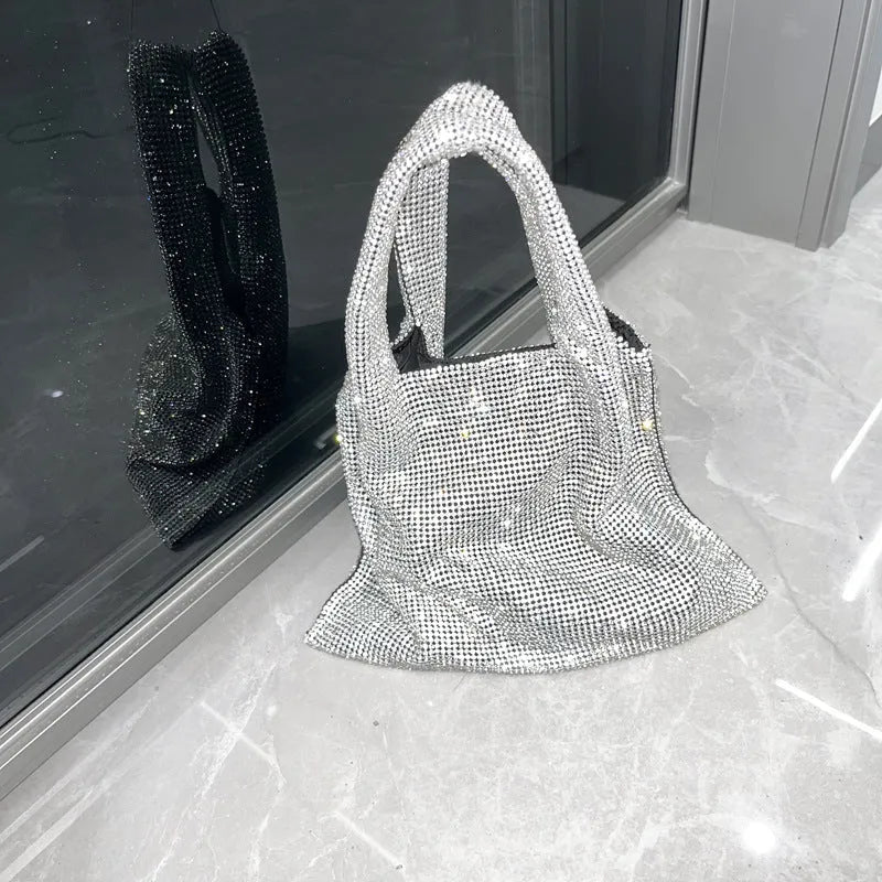 Silver shiny rhinestone handbag made of cotton thread with open pocket, designed for evening parties and dinners.