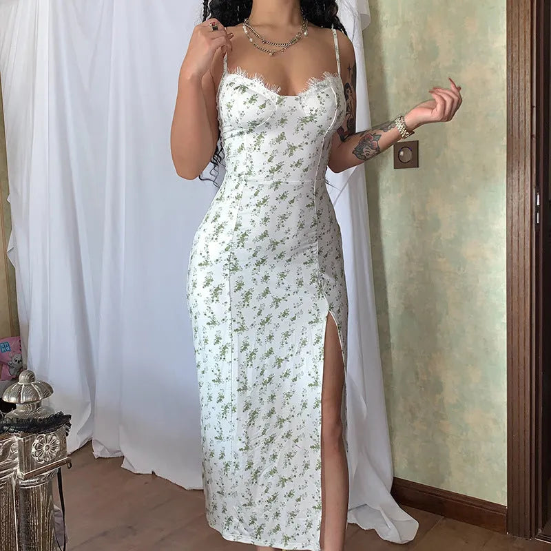Women's blue lace print long dress with suspender straps and a side slit.