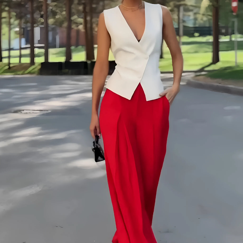 Women's beige two-piece set with deep V-neck sleeveless top and wide-leg trousers