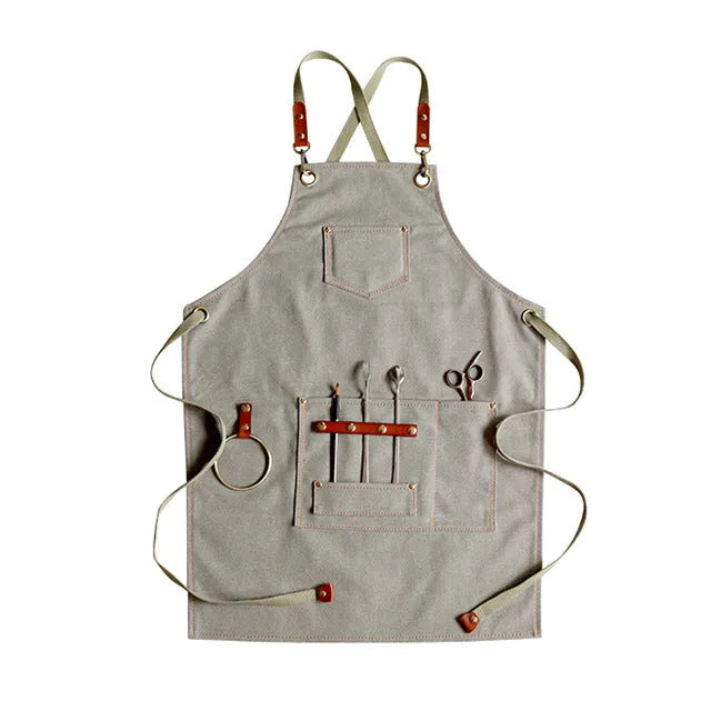 Canvas apron with cross back straps in camel colour for café or baking work