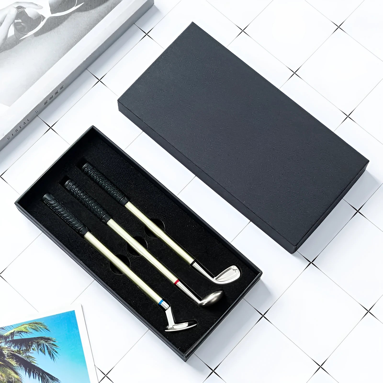 Three metal ballpoint pens with suit pattern design showing 0.7mm writing tips