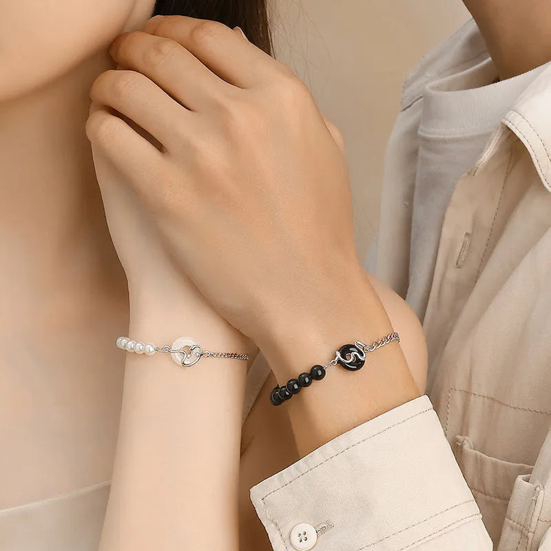 925 sterling silver Chinese obsidian pearl bracelet with safe buckle closure showing animal zodiac snake design
