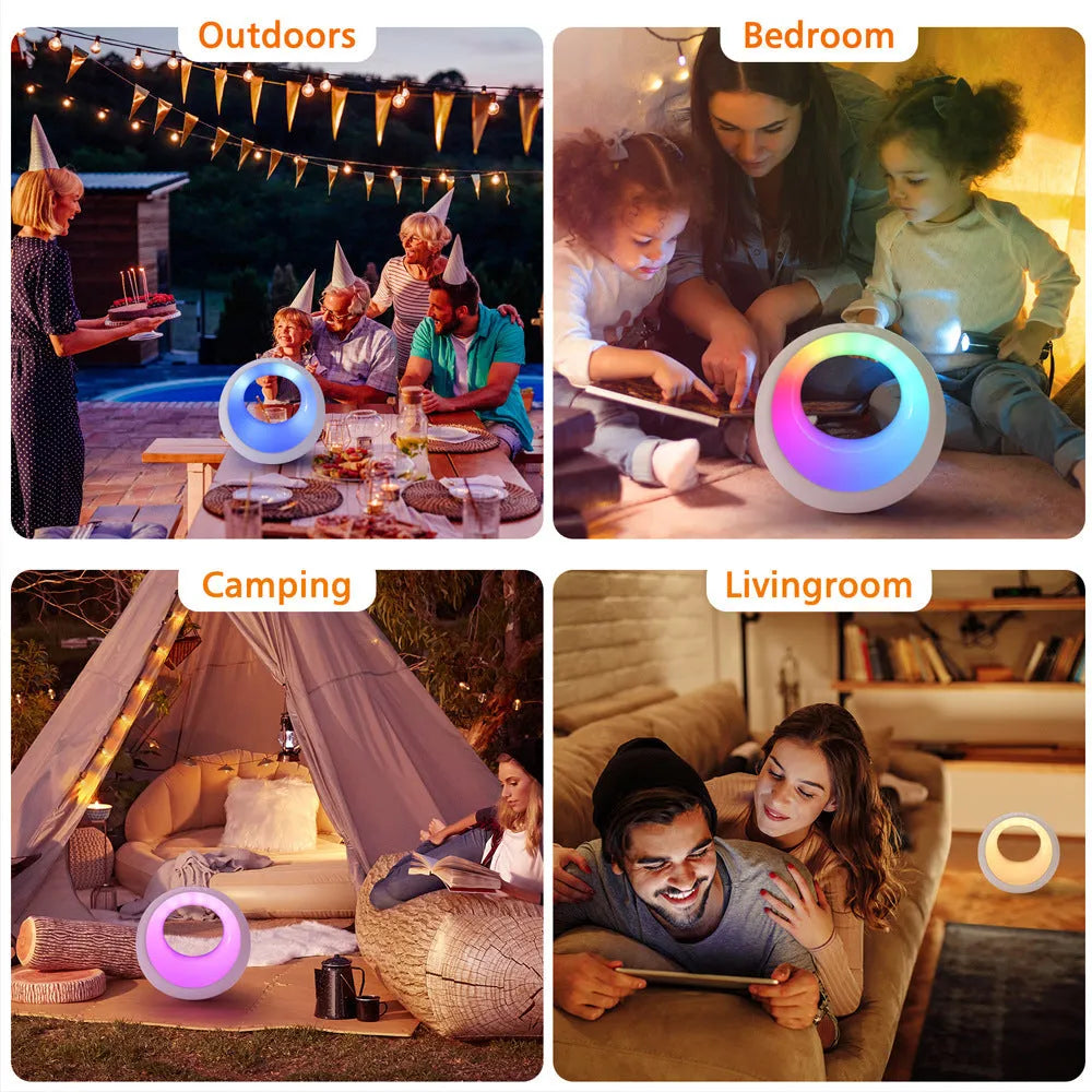 Small white RGB colour changing desk lamp with remote control on a table