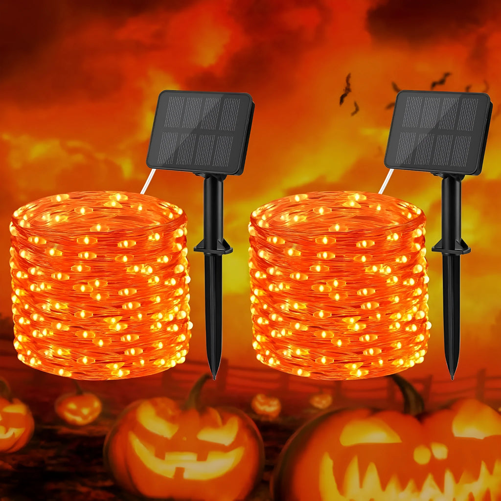 Waterproof solar Christmas courtyard festoon lamp in purple or orange, cartoon ornamental design, single pack