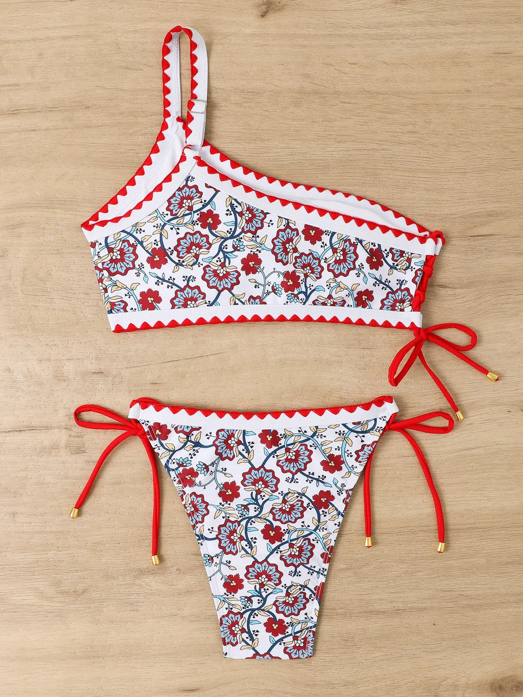 Women's one-shoulder floral bikini set in blue or red, sizes S-XL, polyester lining, two-piece swimsuit.