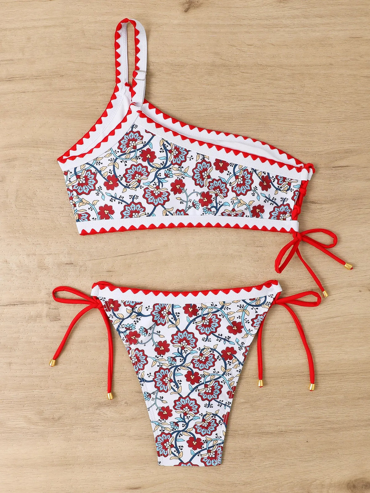 Women's one-shoulder floral bikini set in blue or red, sizes S-XL, polyester lining, two-piece swimsuit.