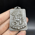 Antique Chinese iron geometric pendant ornament with Yamantaka Aryaacalanatha motif for hanging display