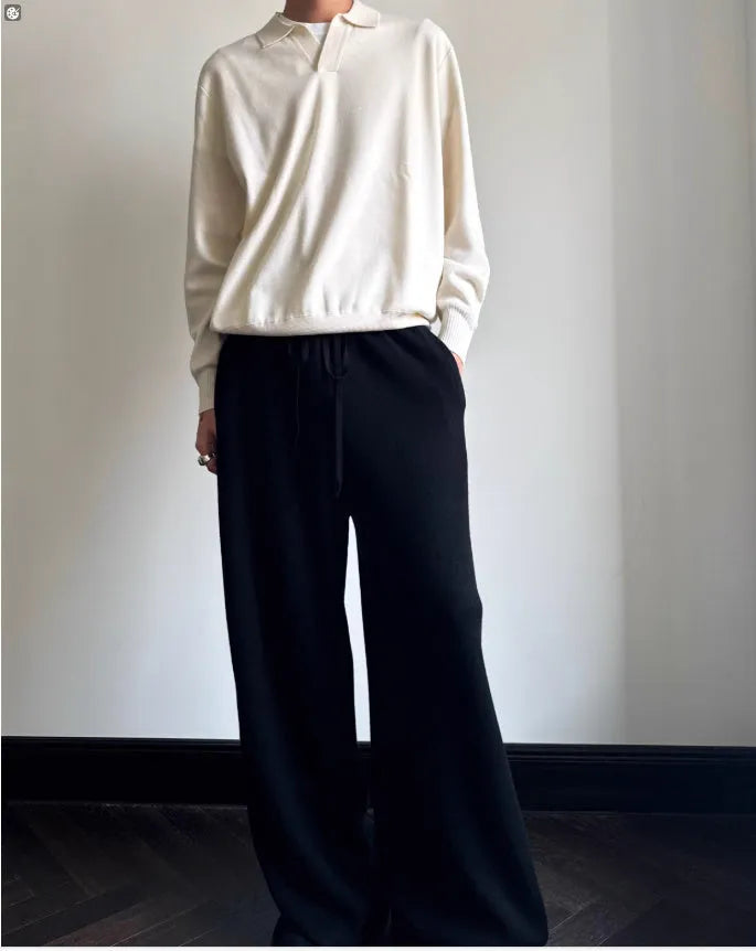 Men's pure wool polo sweater with lapel collar in milky white colour showing loose fit and long sleeves