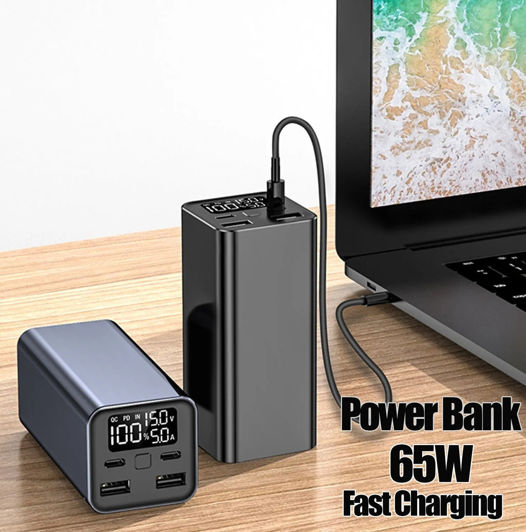High power laptop charging bank with metal casing showing dimensions 47.5 x 104.5 x 47.5mm