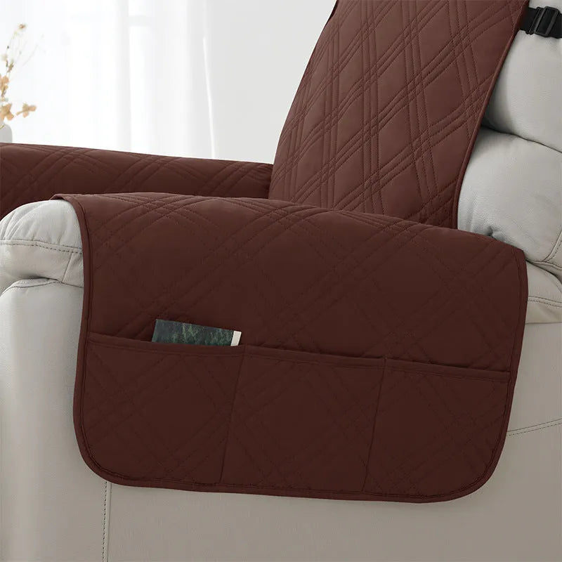 Quilted waterproof sofa cover fitted on a Chivas massage chair, shown in peacock blue colour.