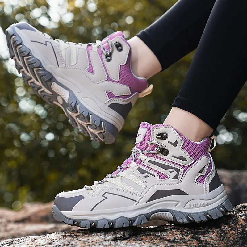 Low-top hiking sneakers in multiple colours with rubber sole and lace-up front for outdoor wear.