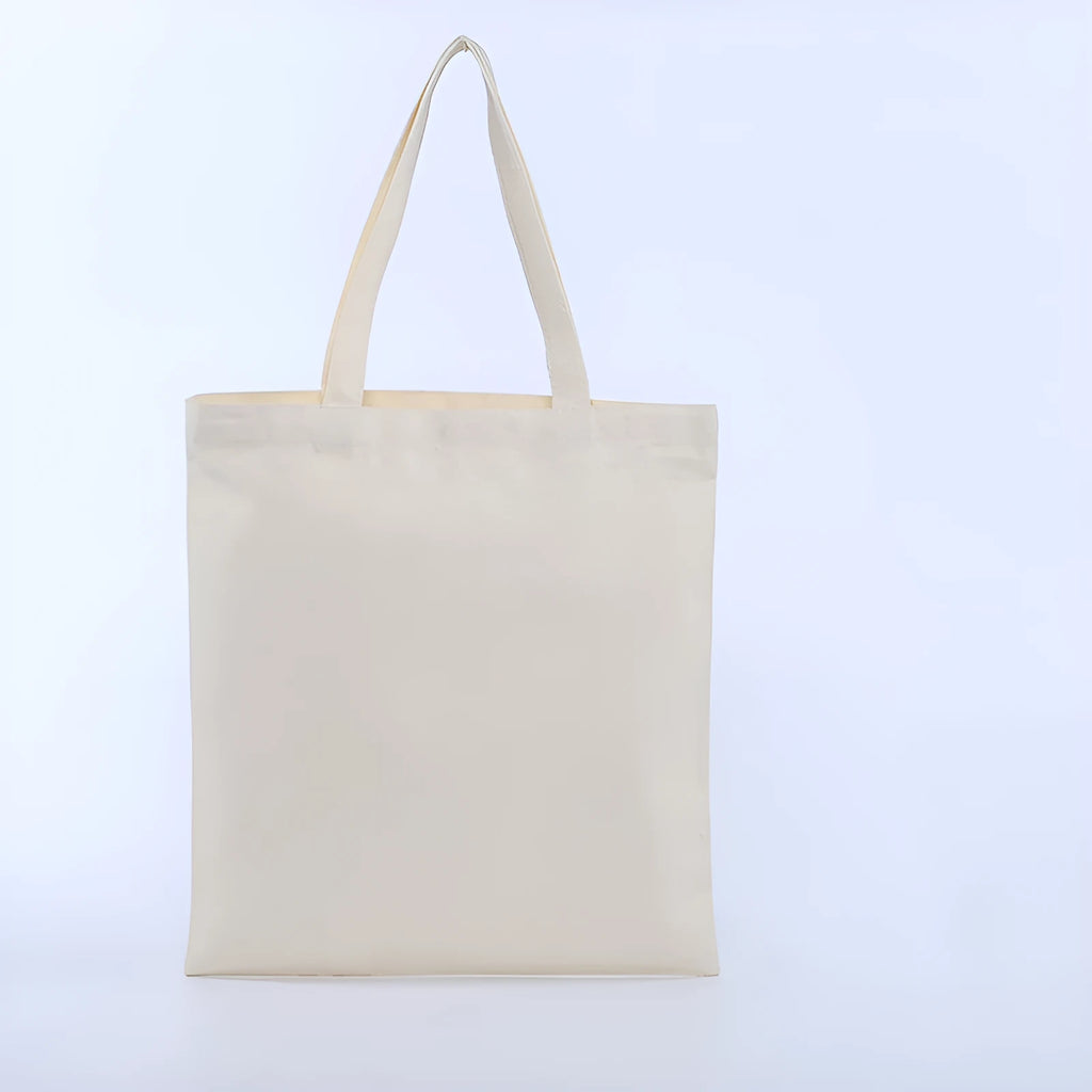 Canvas single shoulder commuter bag in simple modern style, printed finish, available in black and white sizes 35x40cm and 20x25cm