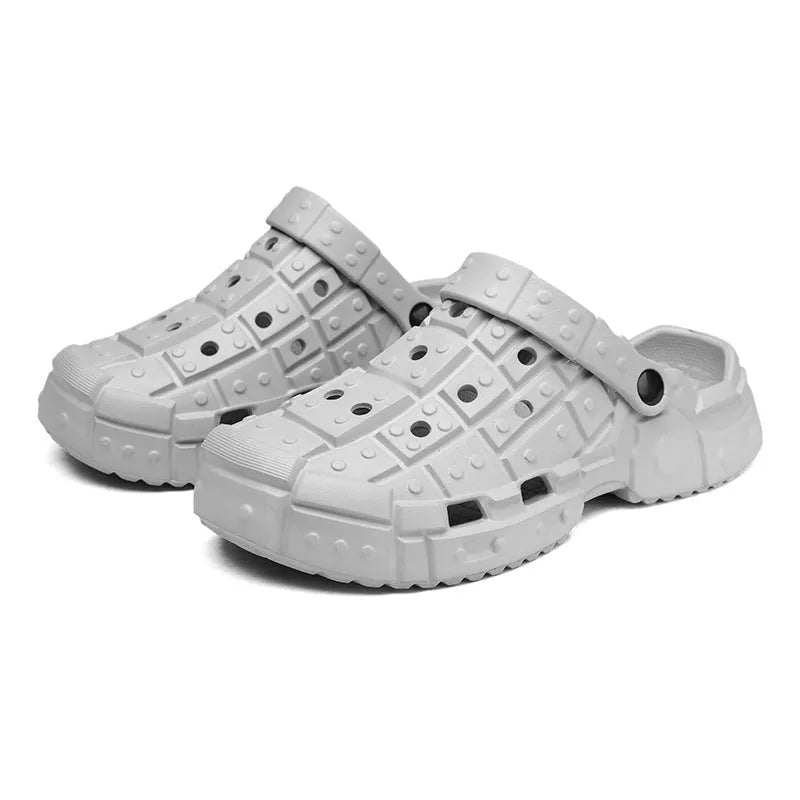 Men's sand coloured EVA hole shoes with thick sole and slip-on design.