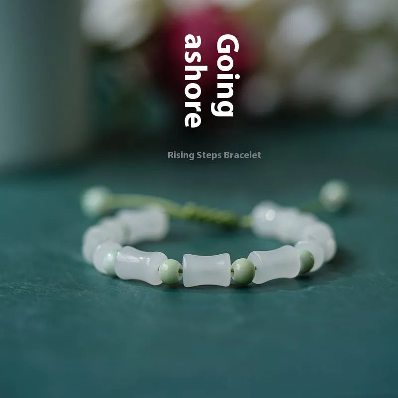 Chinese style glass bamboo leaf bracelet for women with manual craft details.