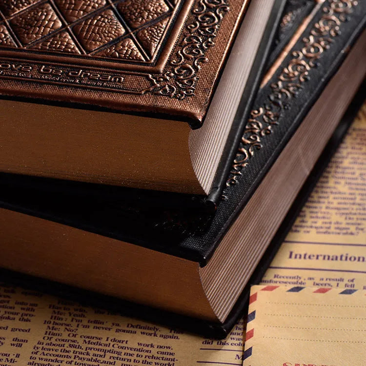 Embossed faux leather notepad with three-dimensional textured cover in bronze and black gold colour options