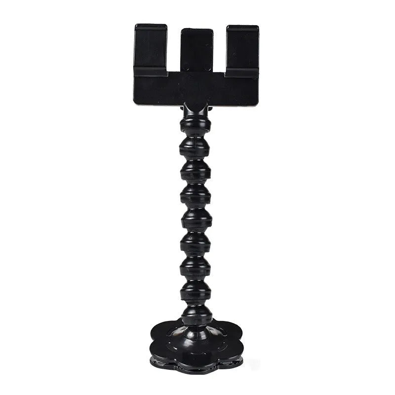 Black plastic pet photography clip holding a phone, with a rotating arm to grip dog or cat treats for photos.