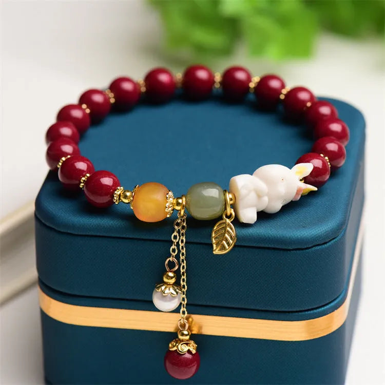 Natural beeswax purple gold sand cinnabar rabbit bracelet for women in Chinese national style.