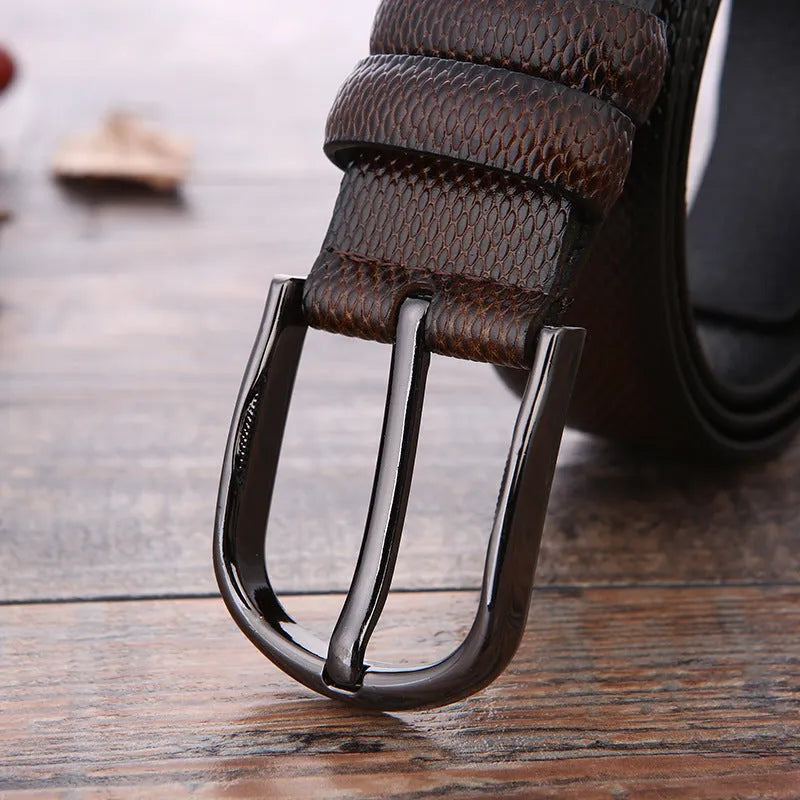 Men's black business belt with alloy pin buckle showing a laser-etched elephant pattern design.