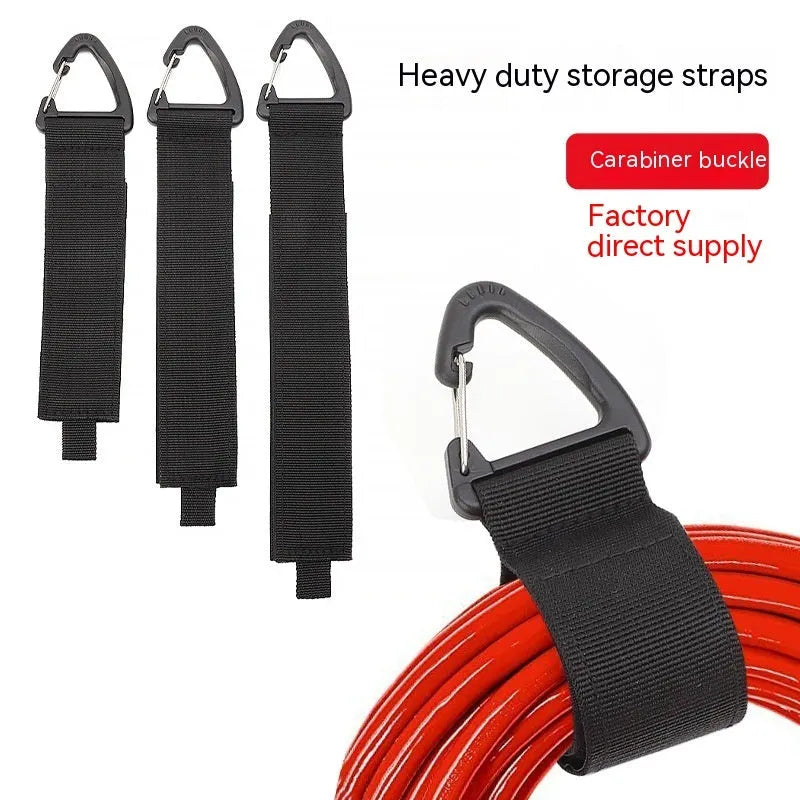 Black heavy-duty carabiner storage strap showing the climbing carabiner hook and 38mm wide blended material.