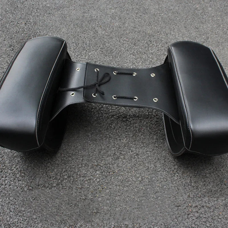 Retro style motorcycle saddle bag in PU leather showing black and brown colour options with 42 cm dimensions