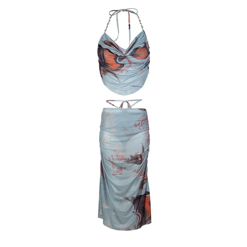 Blue women's three-piece bikini set with diamond chain design and backless briefs.