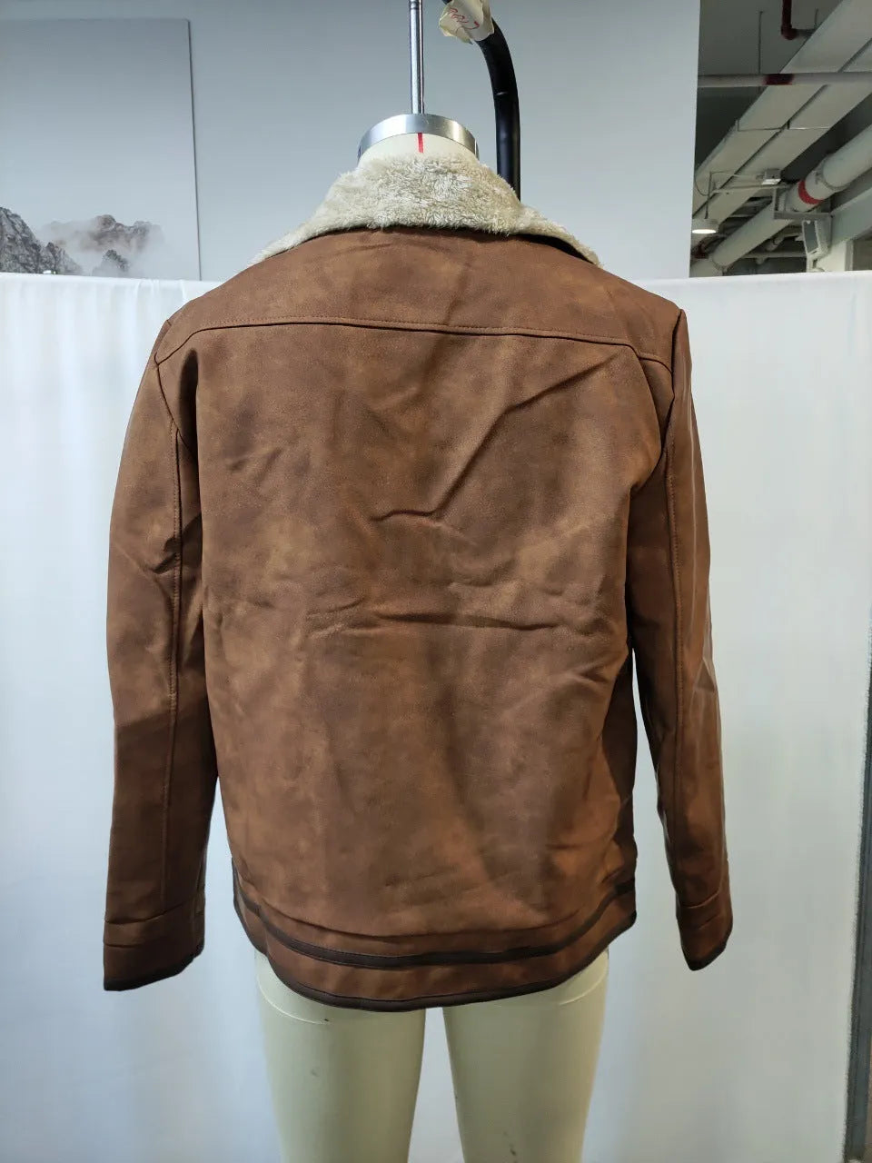 Men's retro brown suede casual jacket with flap pockets, loose fit, mid-length, long sleeves, no hood, solid colour