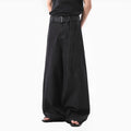 Black straight-leg jeans with high waist, gold detailing and American retro style