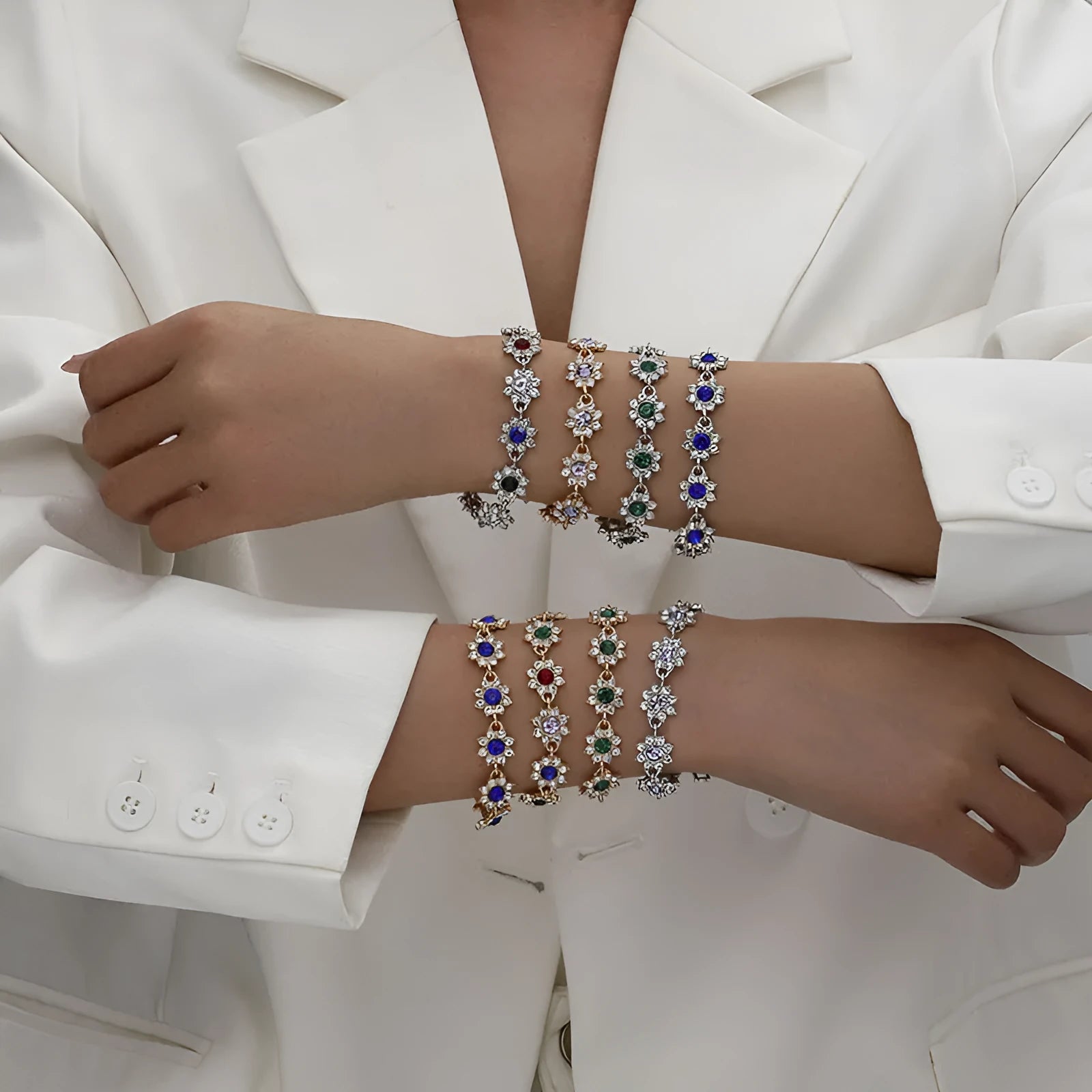 Electroplated zinc alloy flower bracelet with coloured gems in gold and silver colour options