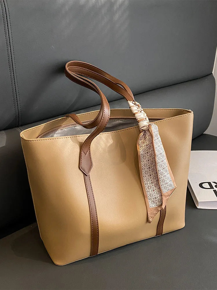 Women's large capacity casual tote shoulder bag in soft bucket design with crossbody strap