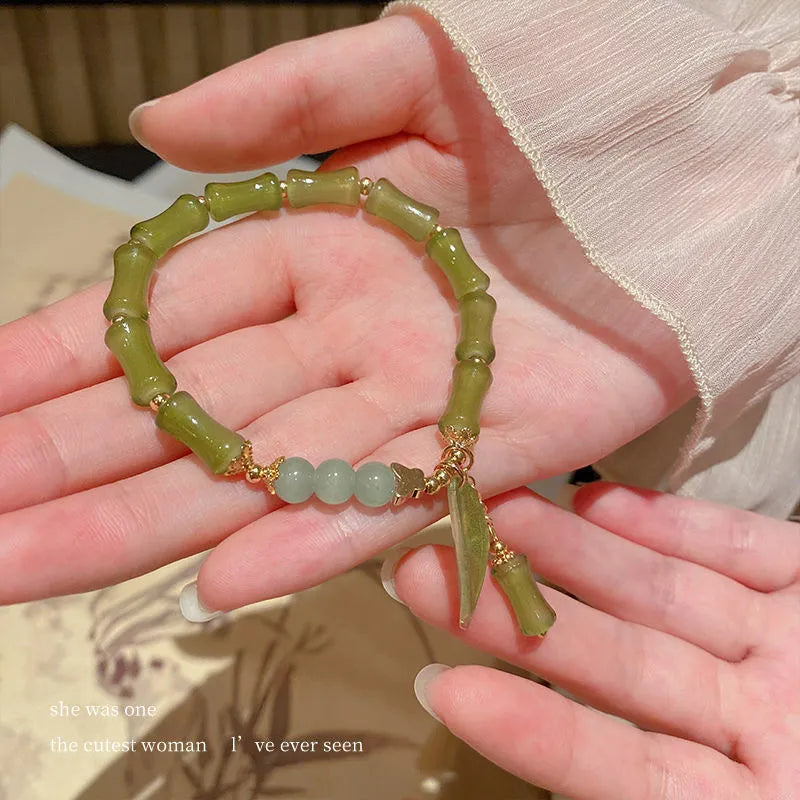 Chinese style glass bamboo leaf bracelet for women with manual craft details.