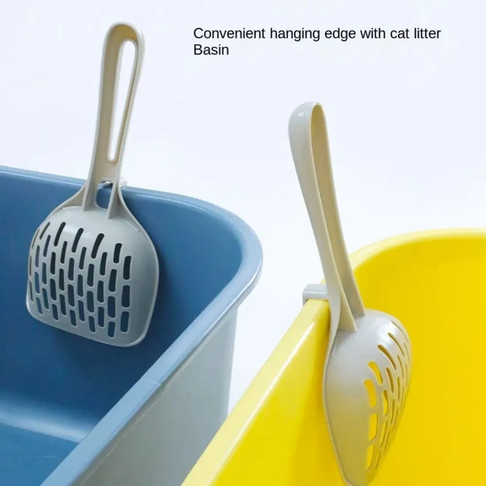Grey plastic cat litter scoop with metal handle and matching storage base tray