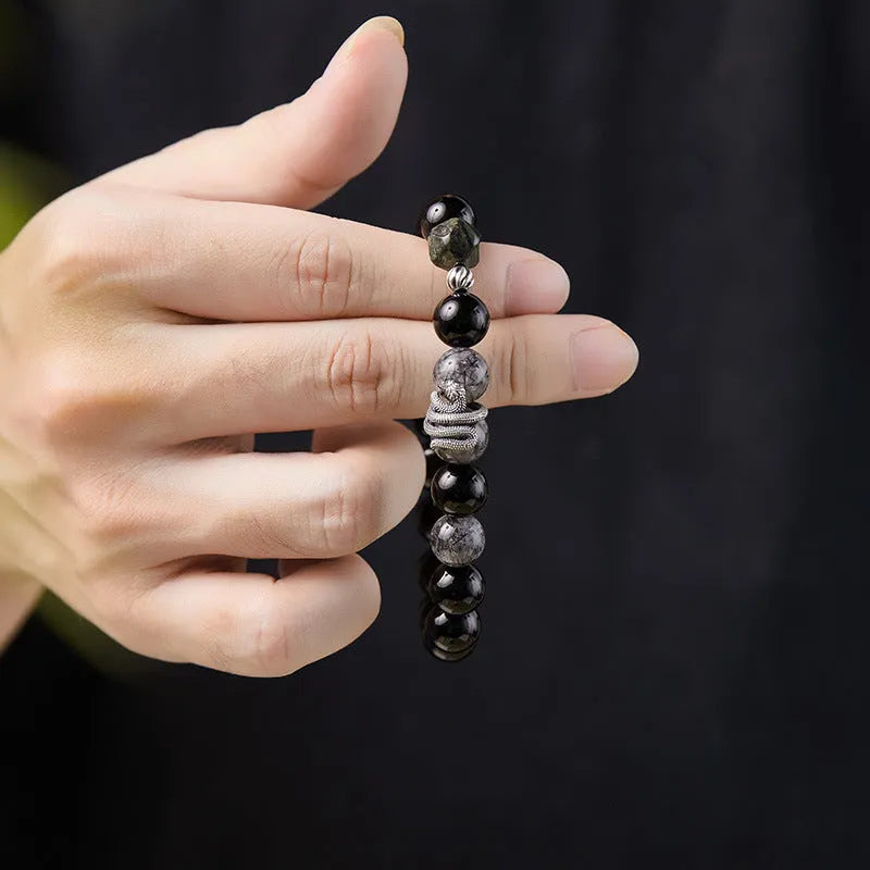 Black retro snake bracelet in 925 sterling silver with obsidian stone, showing animal modelling and certificate