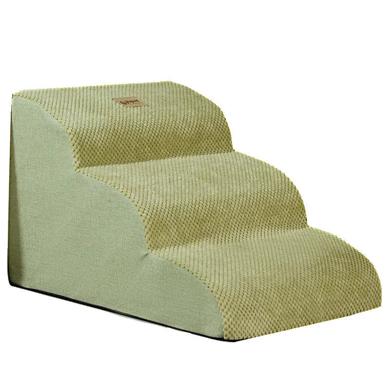 Brown foam pet ramp stairs with non-slip surface on a carpeted floor