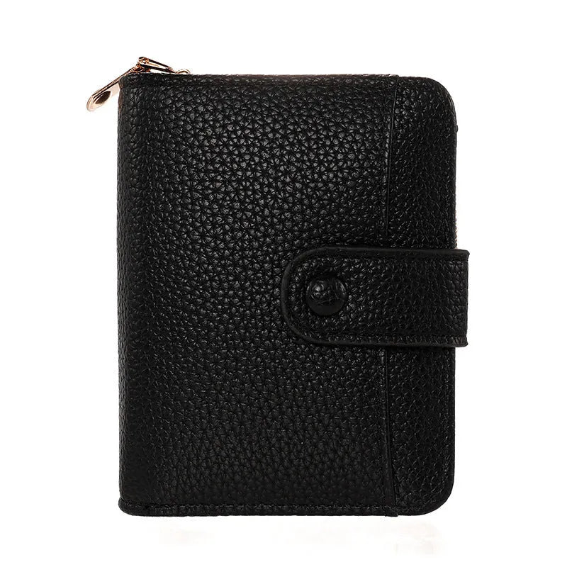 Women's lychee pattern organ short wallet in pu leather available in beige pink black and red colours