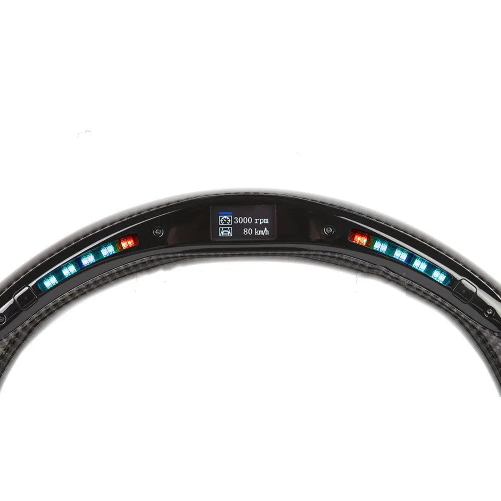 Black carbon fibre BMW sports steering wheel with LED display and multifunctional buttons.