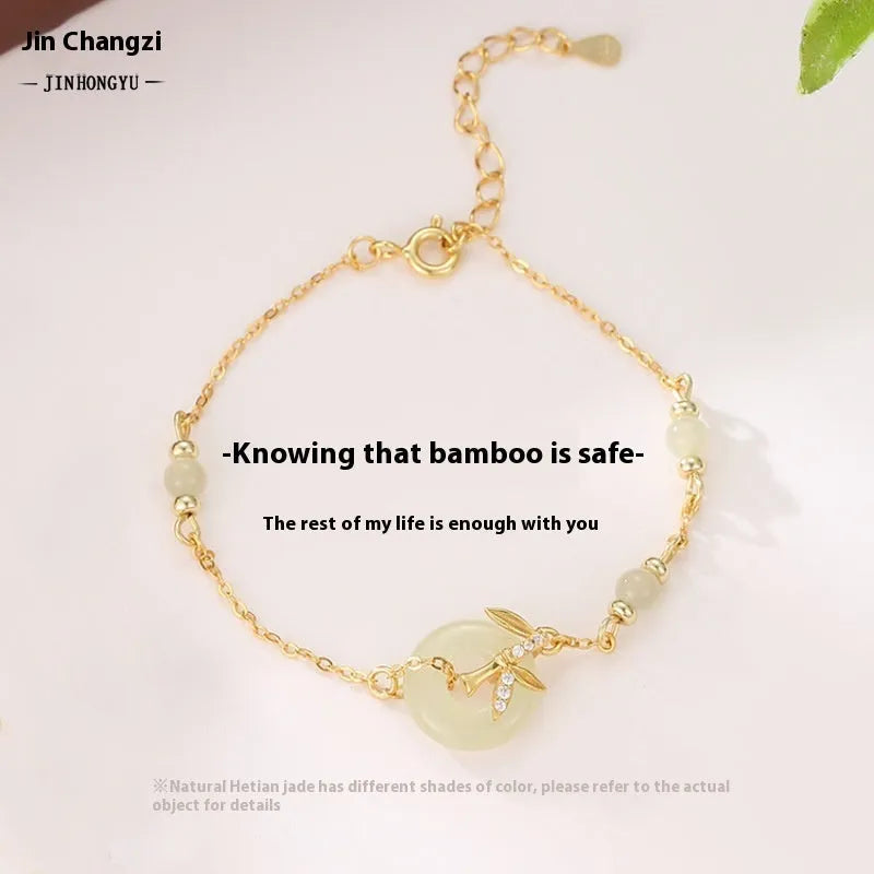 Women's antique style 925 silver bracelet with Hetian jade and peace buckle safety clasp in gold finish