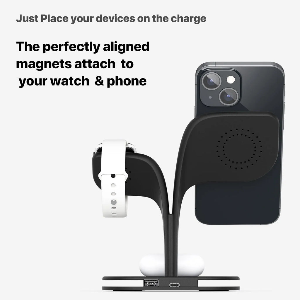 Black and white wireless charging station for phone, watch and headphones on a desk