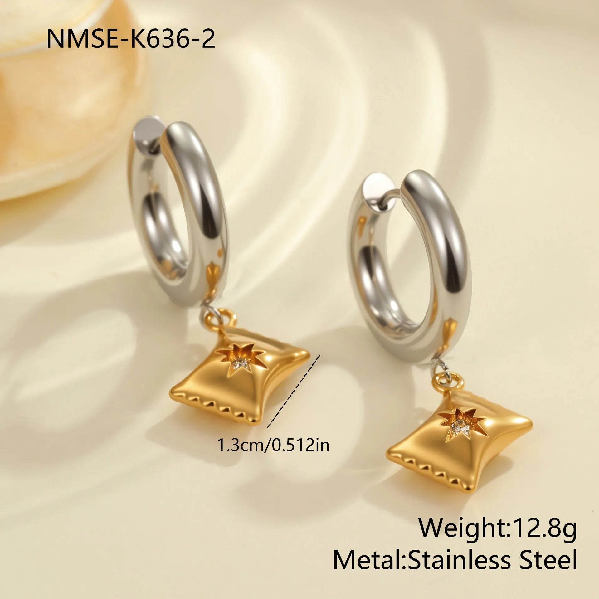 Christmas tree heart earrings in stainless steel with 18K gold plating showing star and geometric shapes