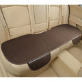 Linen car cushion with hemmed edges in charm coffee colour on vehicle seat