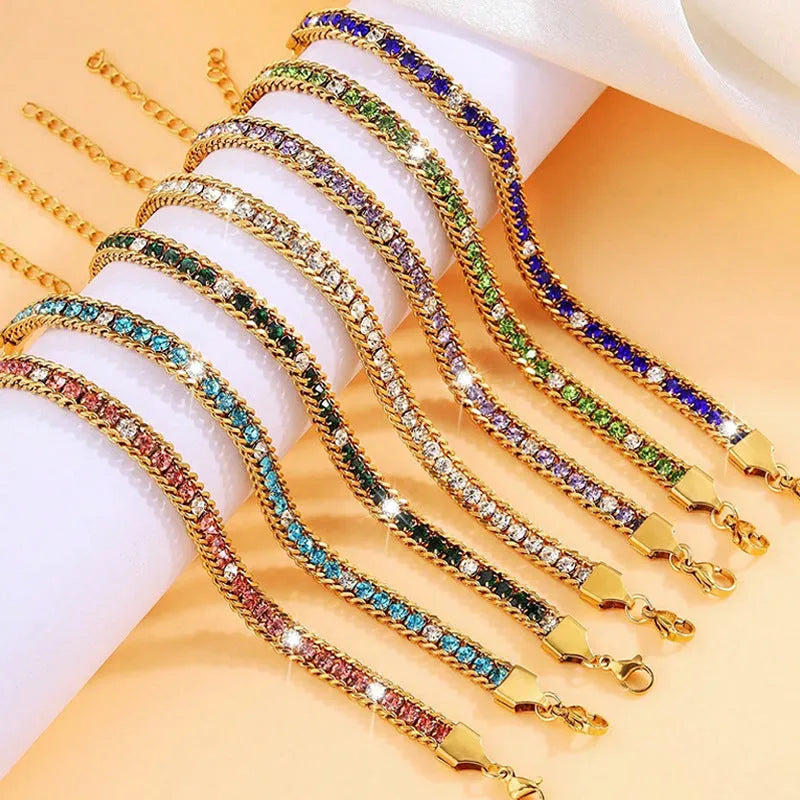 Three-layer gold electroplated stainless steel chain bracelet on women's wrist with geometric links