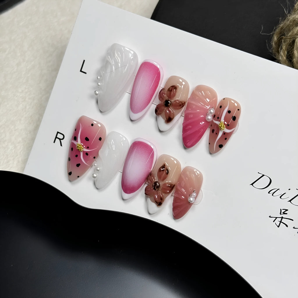 Hand-painted three-dimensional nail patches with embossed candy patterns in almond shape
