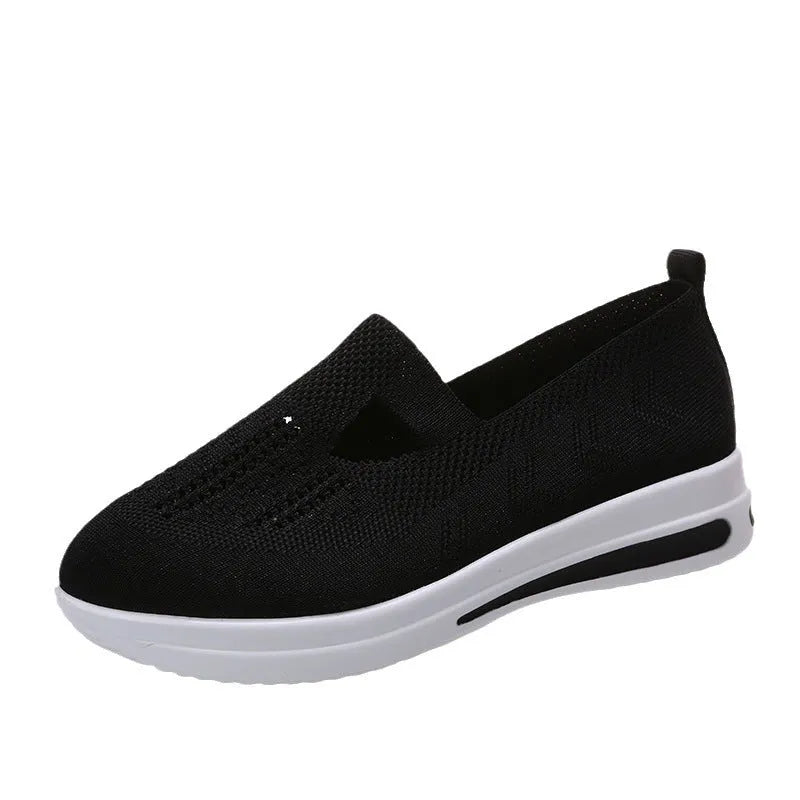 Flat platform wedge casual sneakers with mesh upper, round toe, and rubber sole in black, blue, and pink colours