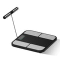 Black electronic household scale with tempered glass platform and colour touchscreen display